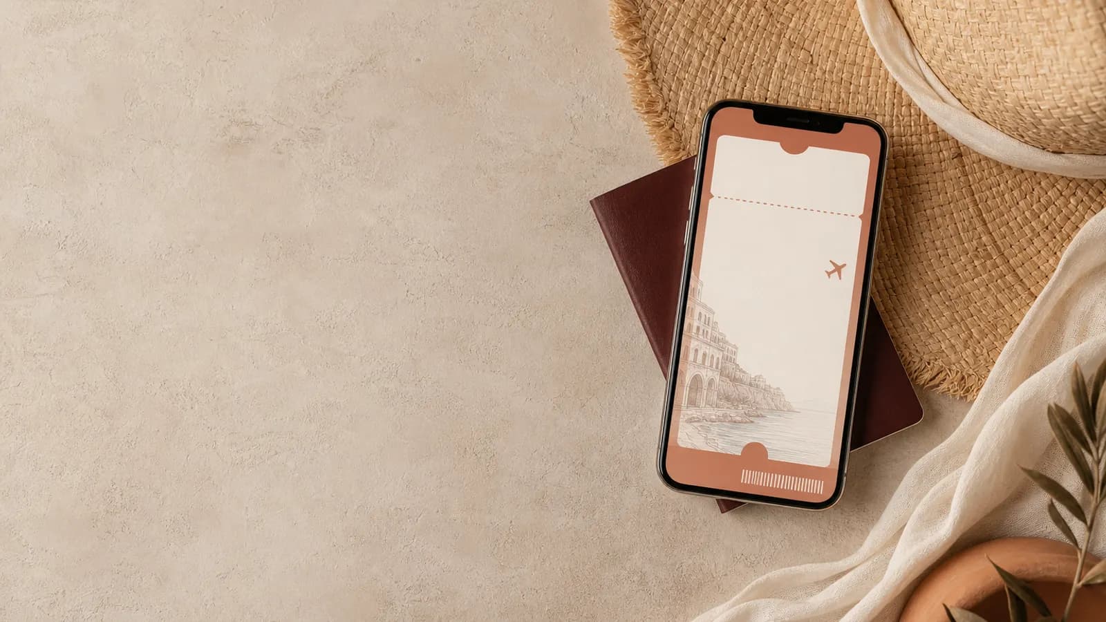 A boarding-pass style save-the-date on a phone resting on a passport and sunhat